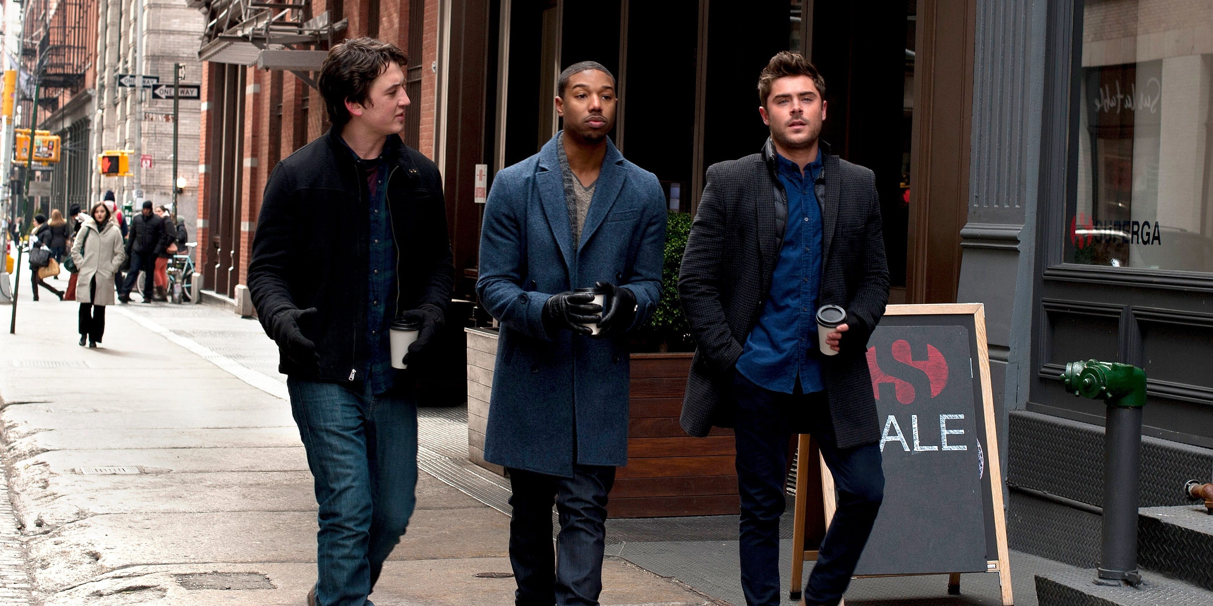 Zac Efron, Miles Teller, Michael B. Jordan in That Awkward Moment walking together with coffee hand