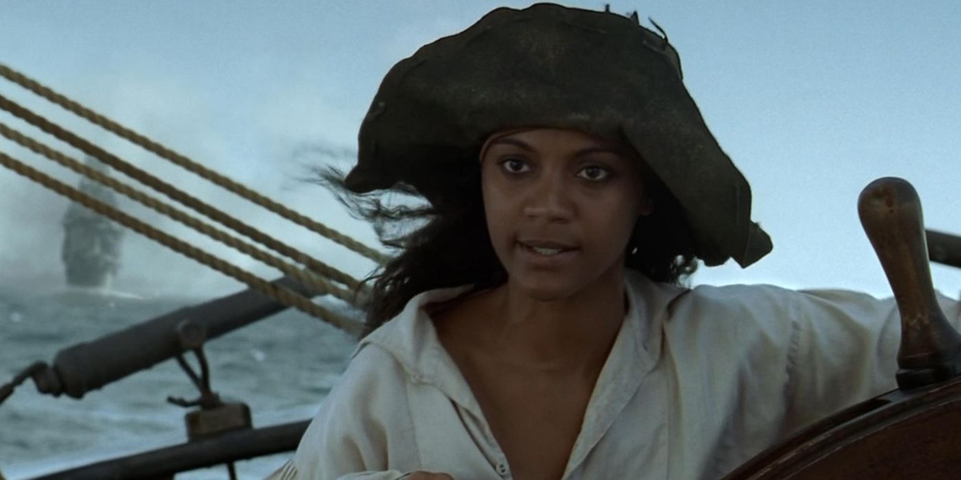 Zoe Saldana as a pirate on the ship in The Curse of the Black Pearl.