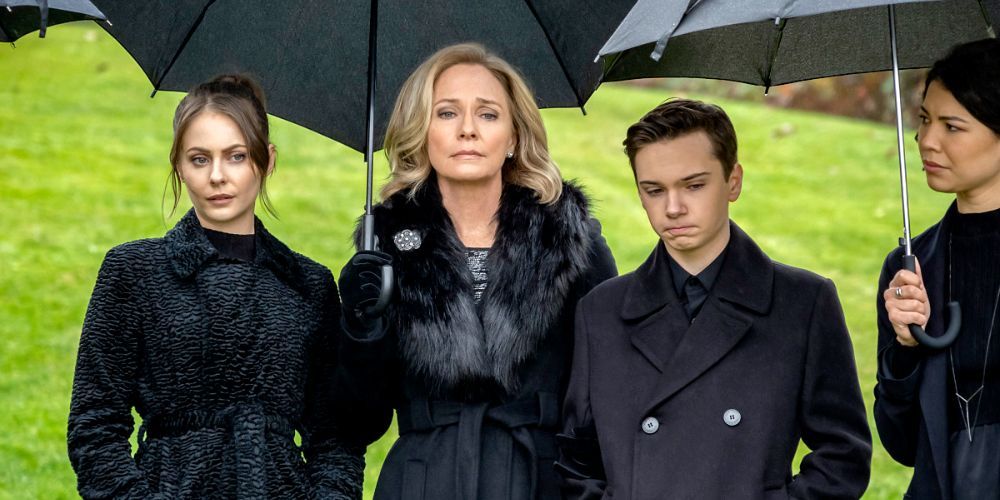 Thea, Moira, William, and Emiko at Oliver's funeral in Arrow