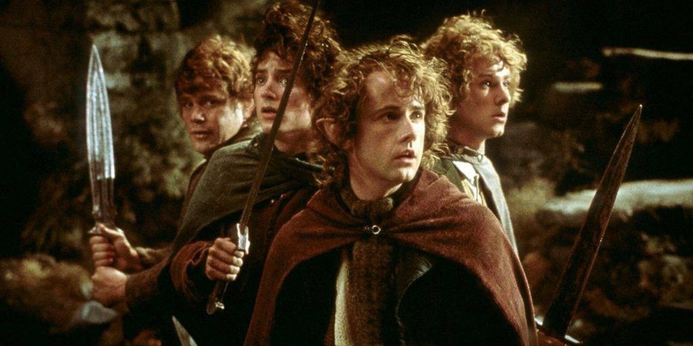 The hobbits wielding swords in Lord of the Rings