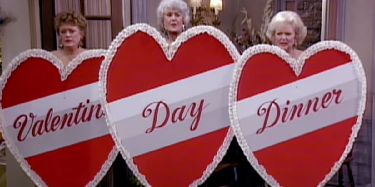 Dorothy Blanche and Rose holding paper hearts over their bodies at a nude resort for their Valentine's Day vacation
