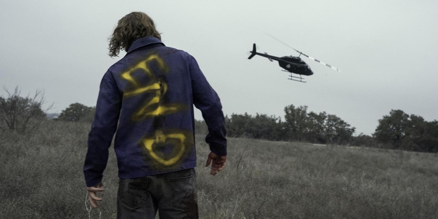 A reanimated Riley watches as a CRM helicopter flies away on Fear the Walking Dead