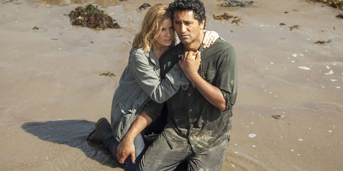 Travis, distraught on his knees, Madison consoling him on Fear the Walking Dead