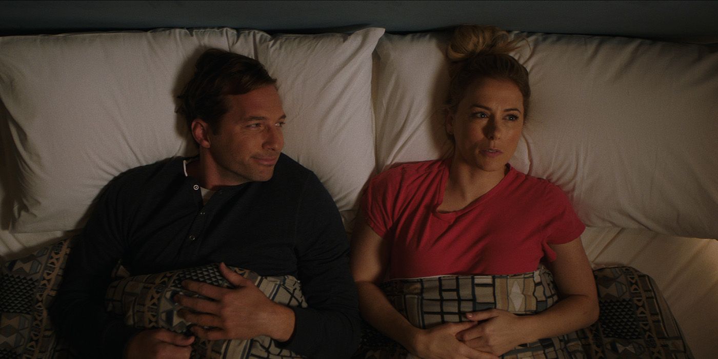 Dennis and Andrea in bed together in Good on Paper