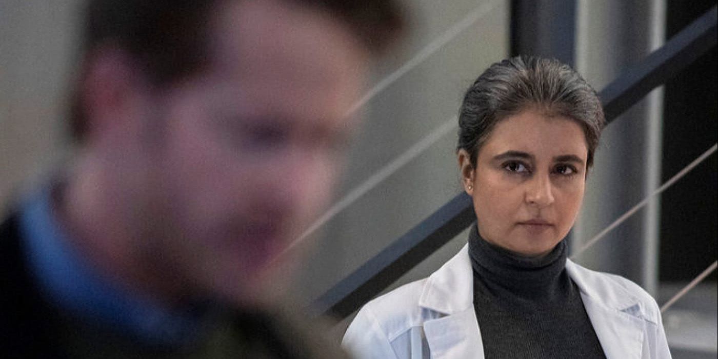 Dr. Aria Gupta looking angrily at a blurred out Ben in the foreground on Manifest