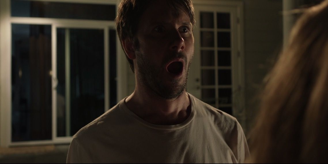 Daniel in catatonic mode staring with mouth open in Dark Skies movie