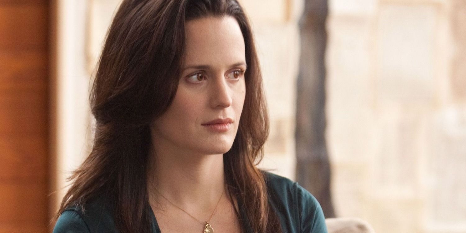 Elizabeth Reaser as Esme Cullen looking serious in a brightly lit room in Twilight