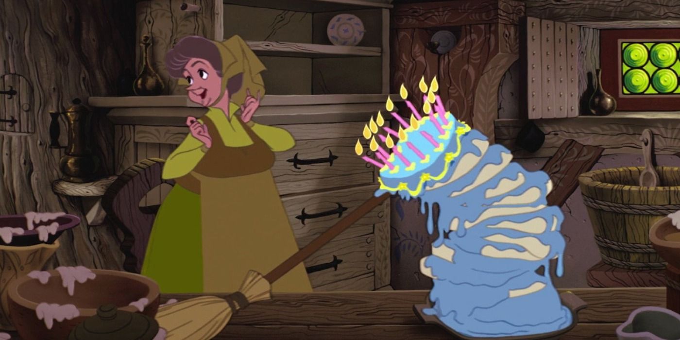 Fauna smiling while a cake is barely held upright by a broom in Sleeping Beauty