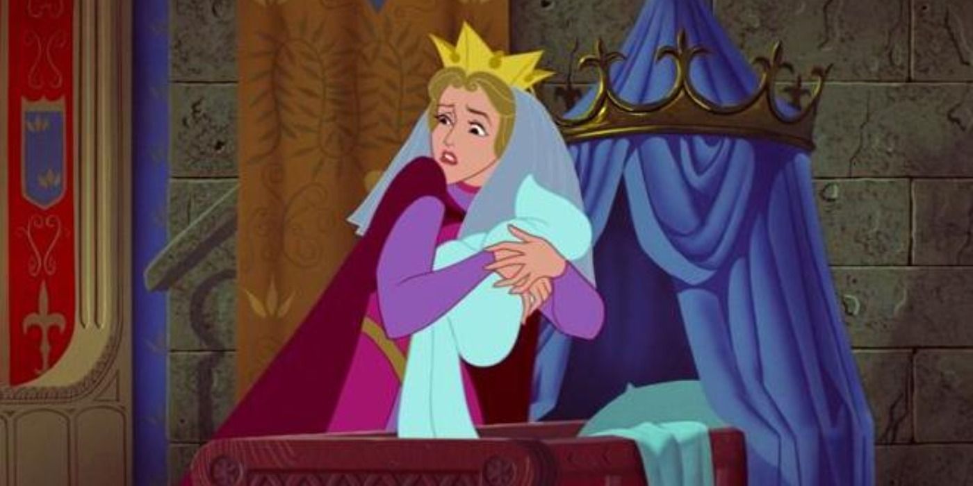 Queen Leah holding baby Aurora in Sleeping Beauty
