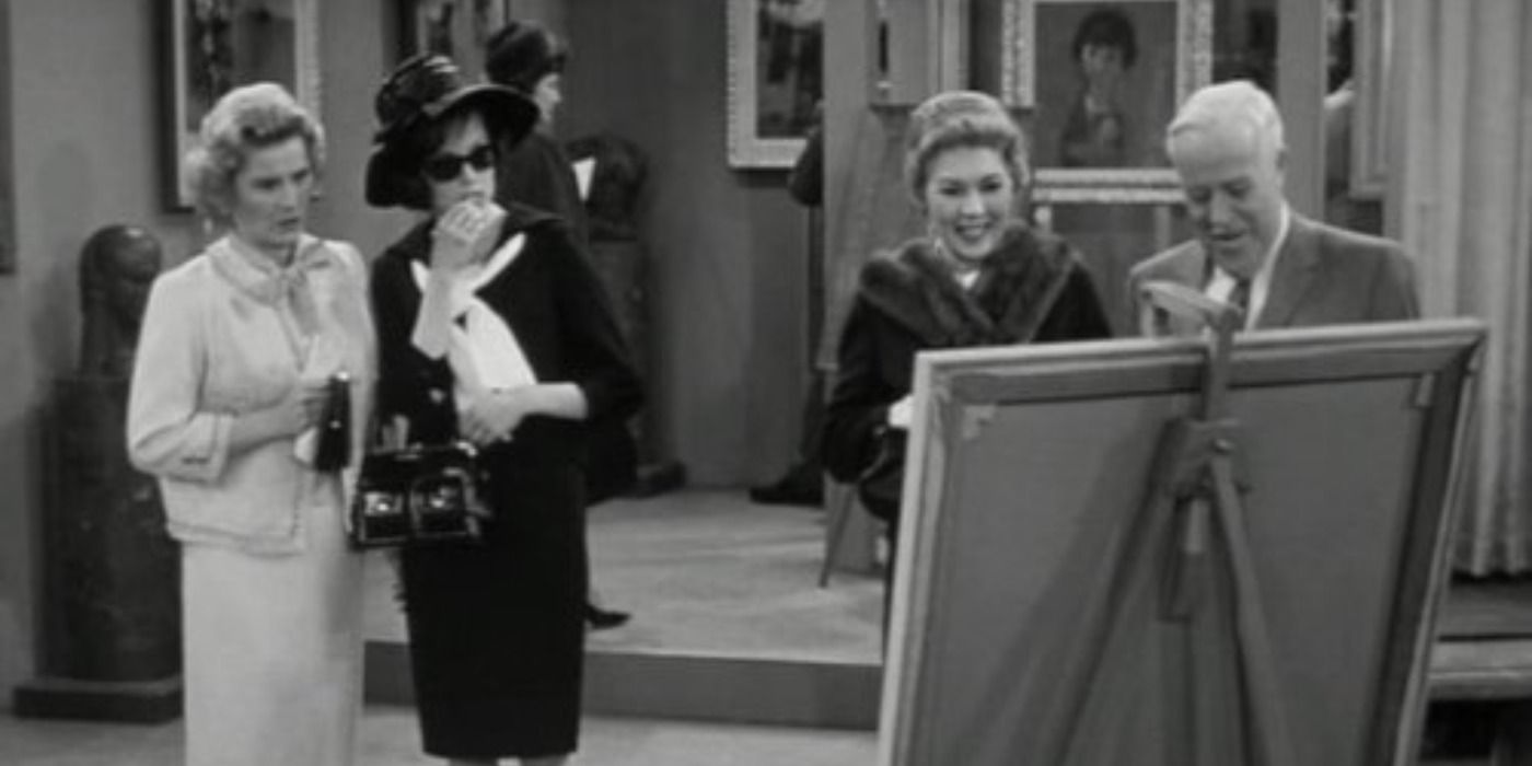 Sally and Laura looking at a painting with another couple to their right in The Dick Van Dyke Show