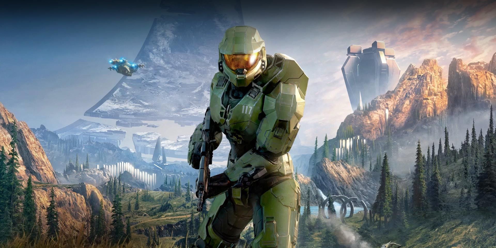 poster for Halo Infinite featuring Master Chief standing with a gun on a Halo ring