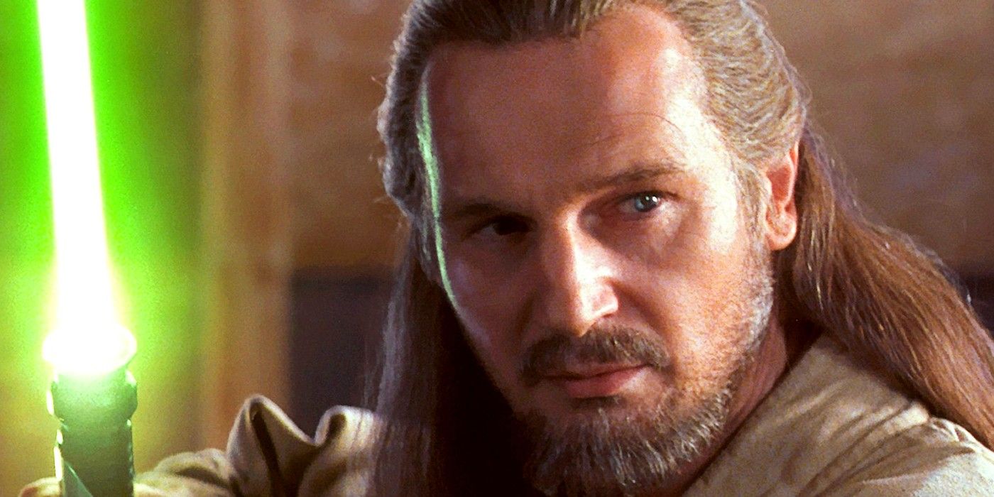 Qui Gon wielding his lightsaber