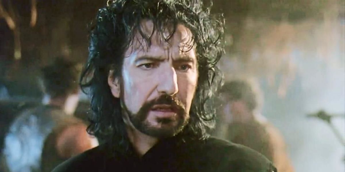 Alan Rickman as the Sheriff of Nottingham looking displeased in Robin Hood: Prince of Thieves