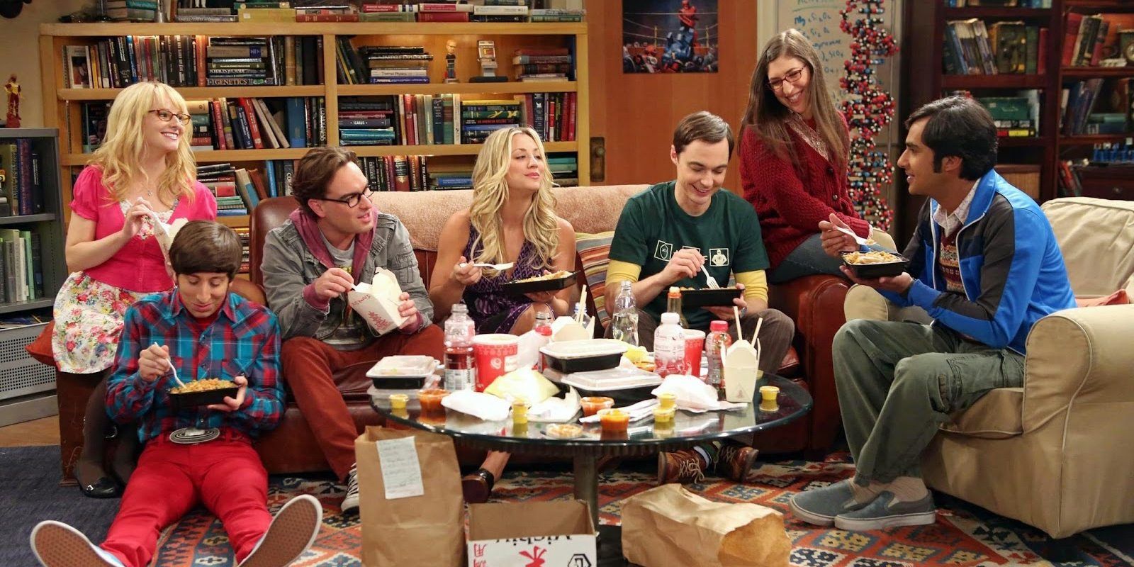 The gang in The Big Bang Theory eating take out