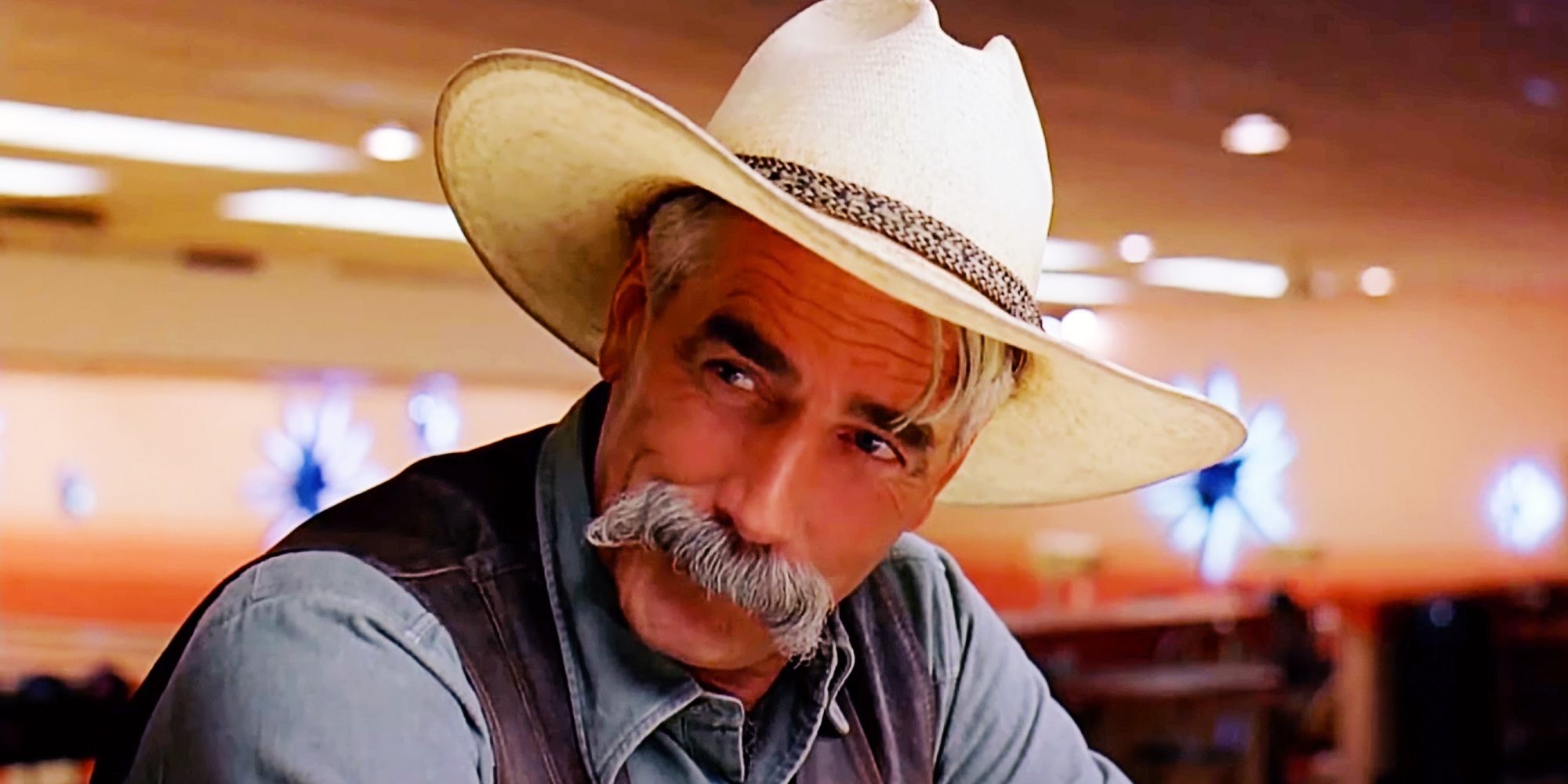 Sam Elliott looks on in a cowboy hat from The Big Lebowski