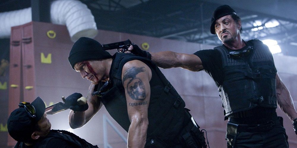 Barney rescues Yin Yang in The Expendables