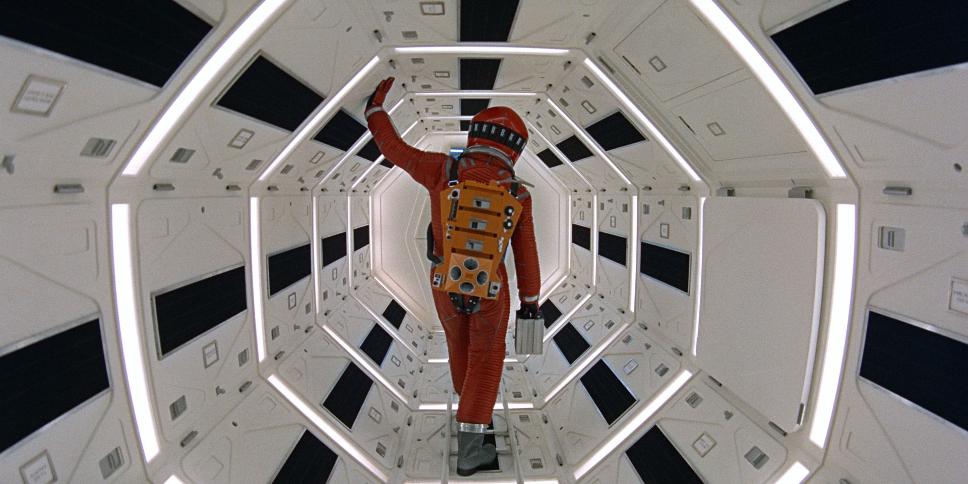 Man in an orange space suit from the film 2001 A Space Odyssey.