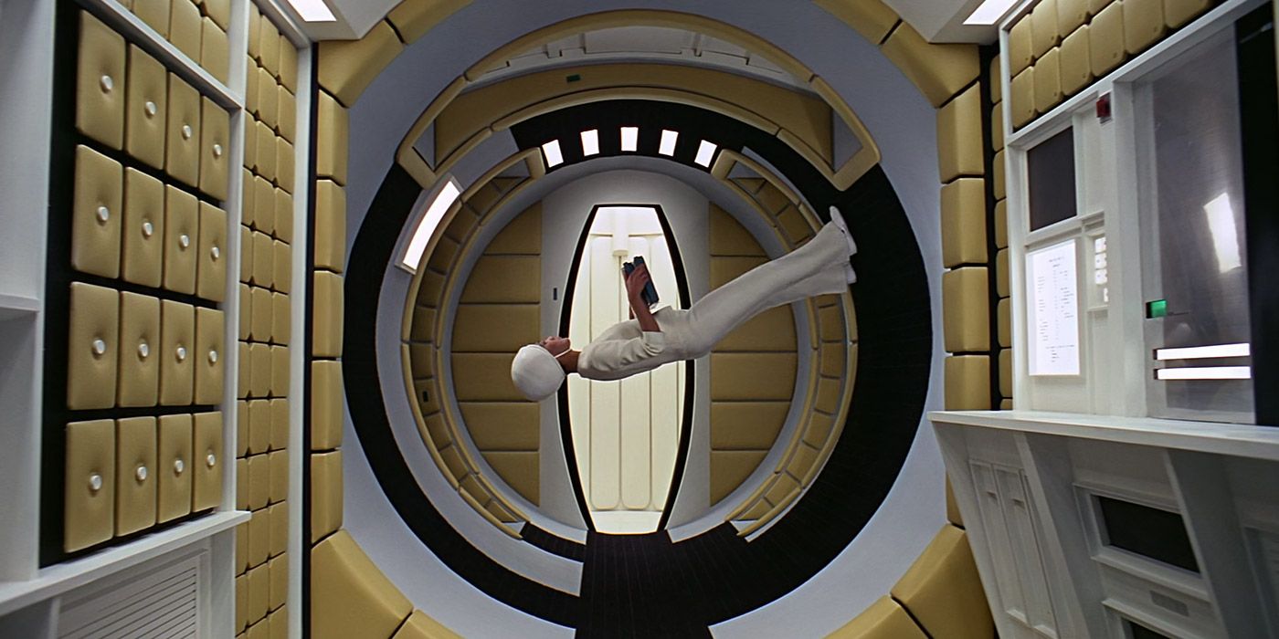 A stewardess delivers food in an artificial gravity environment in 2001: A Space Odyssey