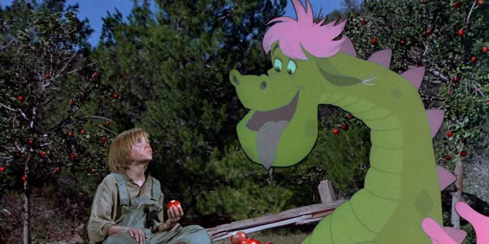 Pete and the dragon in the forest in Pete’s Dragon