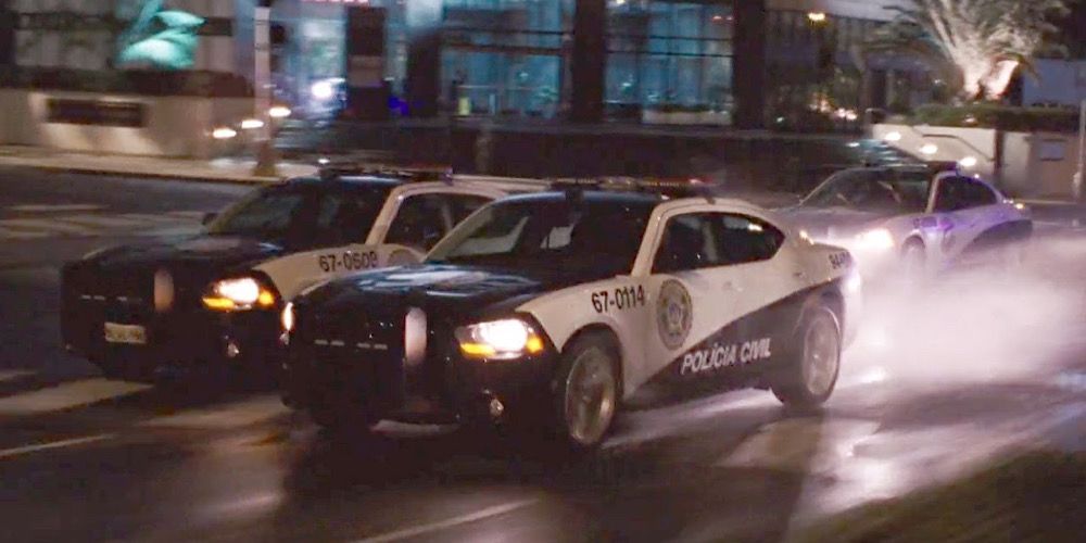 Dom and Brian race in cop cars in Fast Five