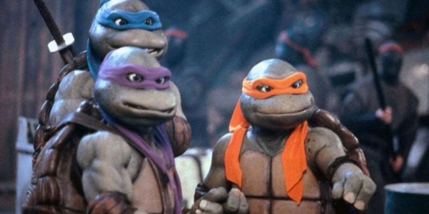 Donatello, Leonardo, and Michelangelo standing together in Teenage Mutant Ninja Turtles 