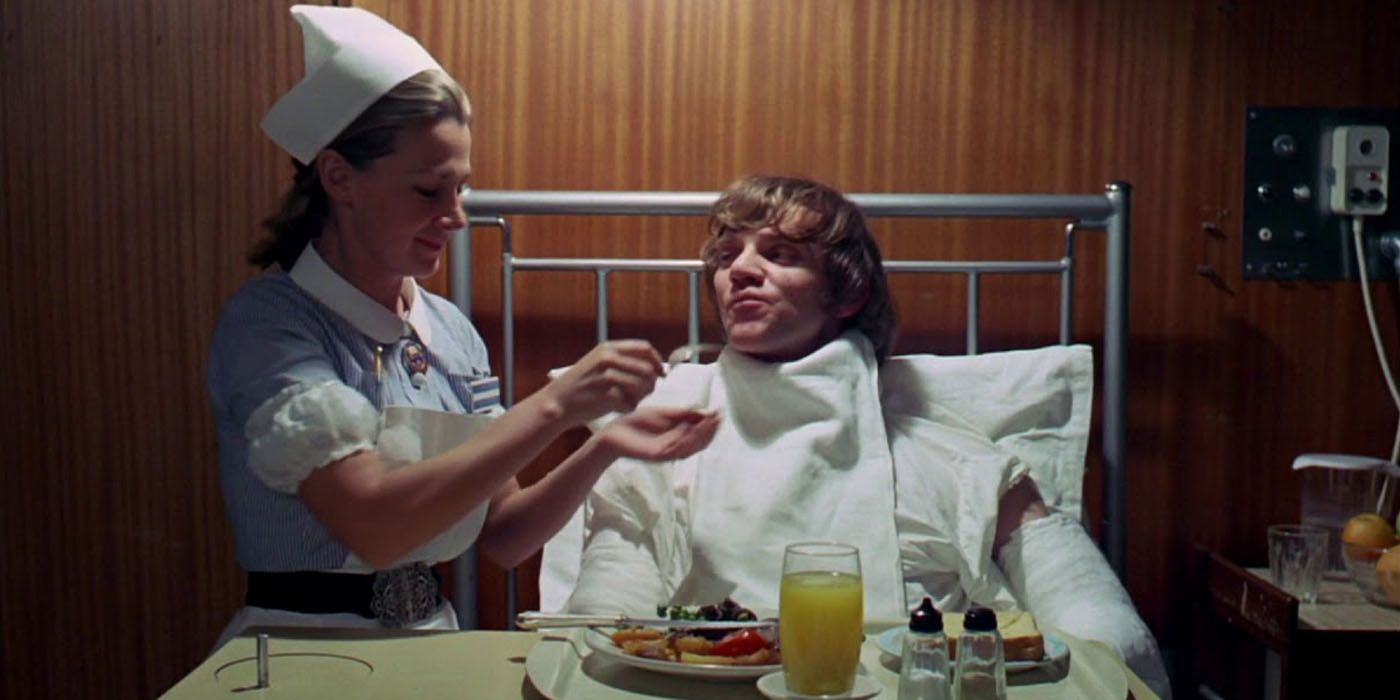Alex in the hospital being fed by a nurse at the end of A Clockwork Orange.