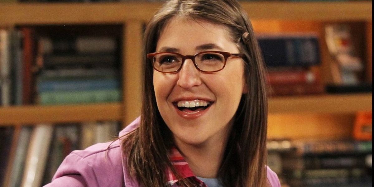 An image of Amy smiling in The Big Bang Theory