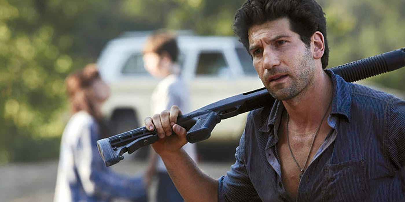 An image of Shane holding a shotgun over his shoulder as he is on a lookout in The Walking Dead