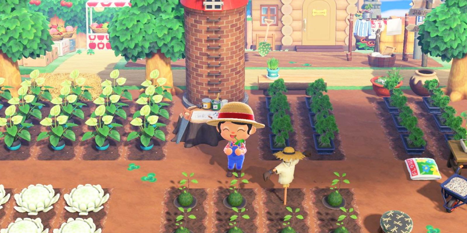 The player is holding a crop in the middle of their farm in Animal Crossing New Horizons.