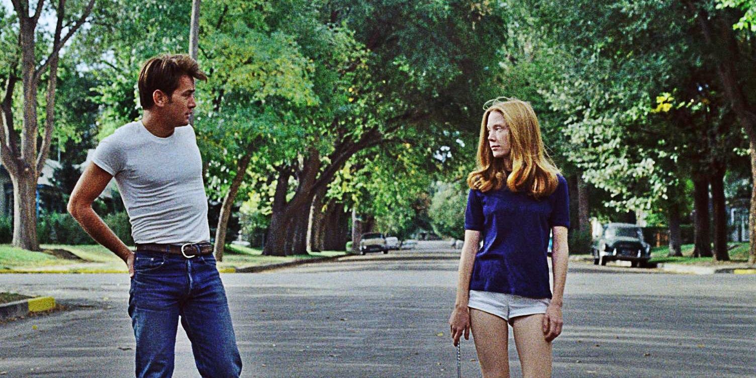 Sissy Spacek and Martin Sheen looking at each other in road in Badlands