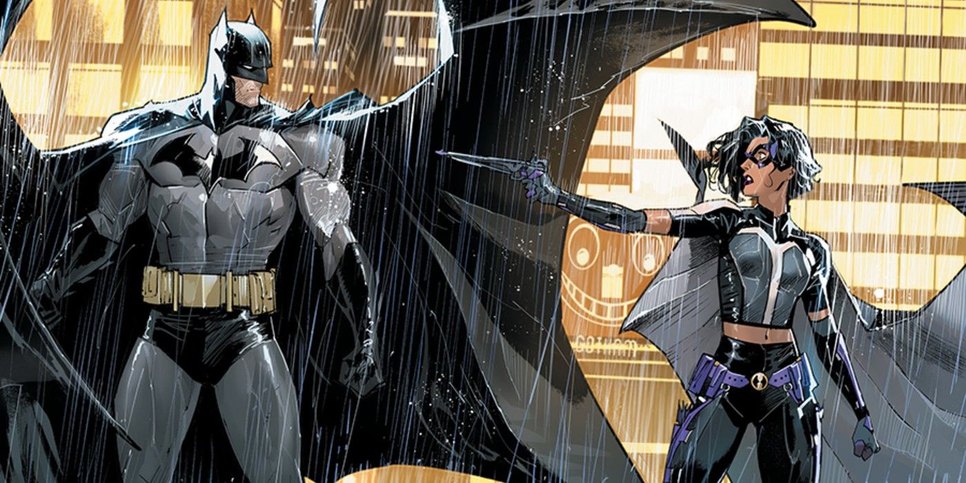 Huntress aims her crossbow at Batman as it rains
