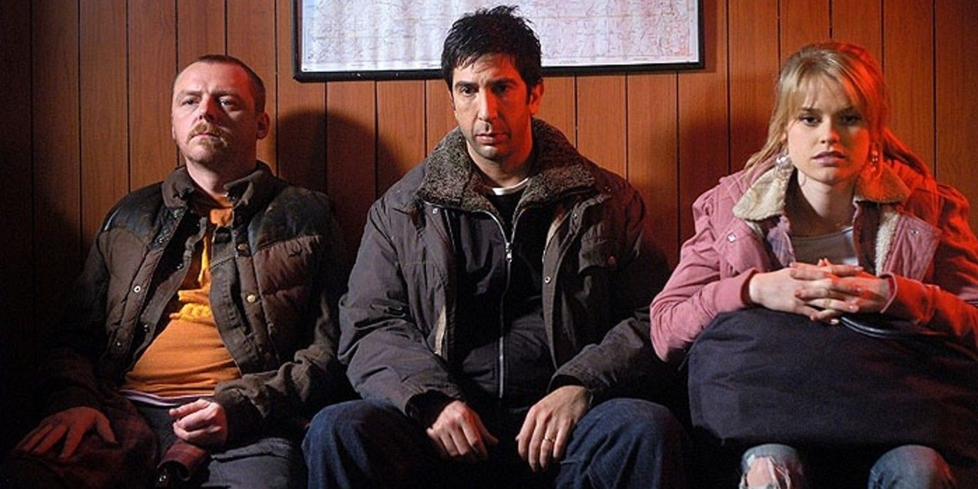 Adam Eve, Simon Pegg and David Schwimmer sit together on chairs in Big Nothing