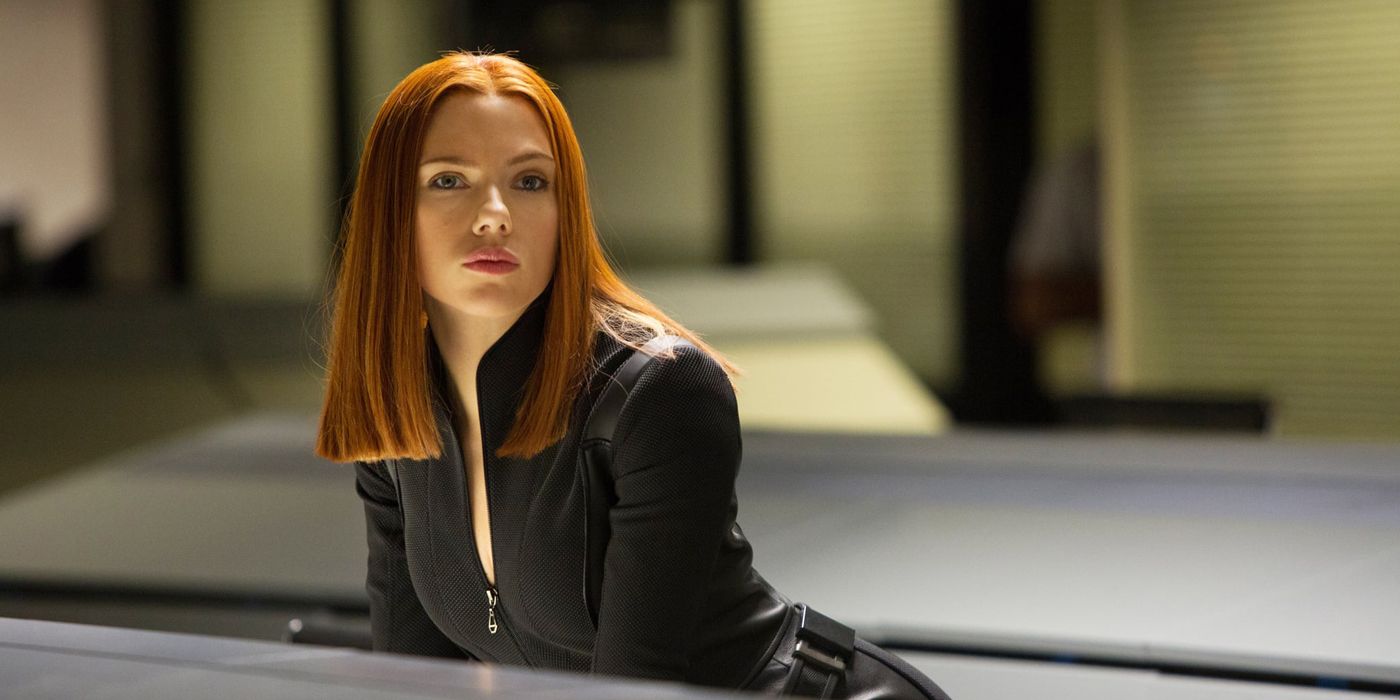 Black Widow leaning on a panel in Captain America Winter Soldier.