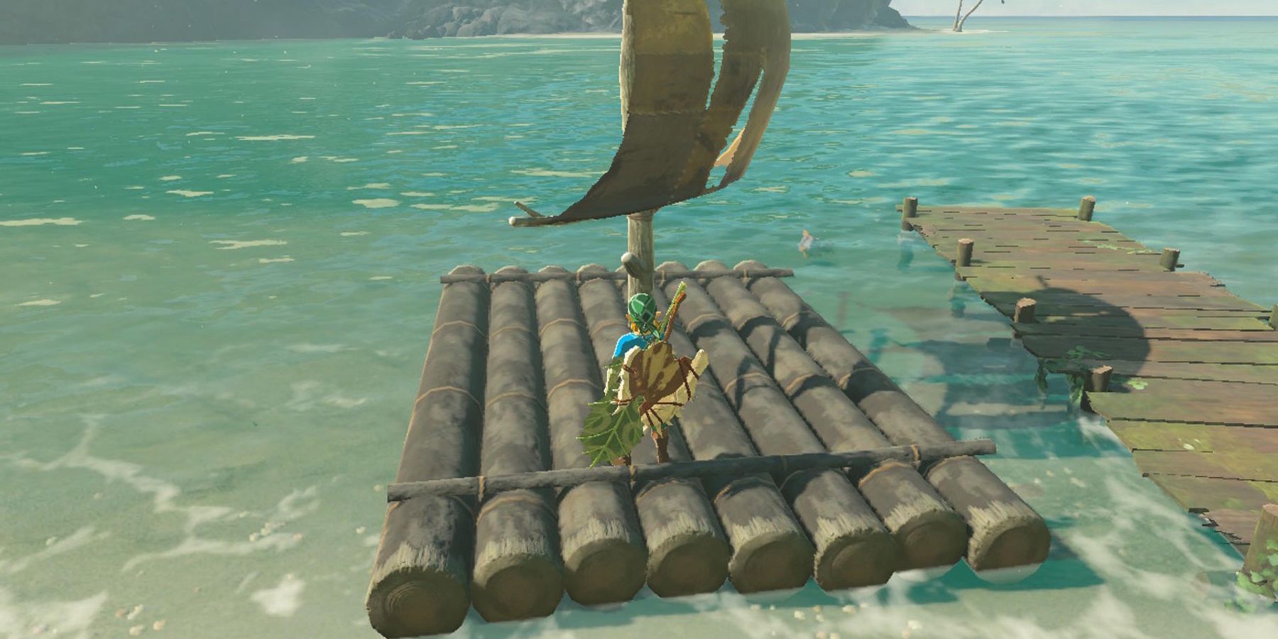 Link standing on a raft next to a dock in Breath of the Wild.