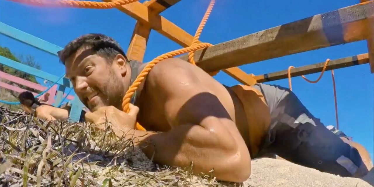 Bret untangling himself from ropes on Survivor: Millennials Vs. Gen X