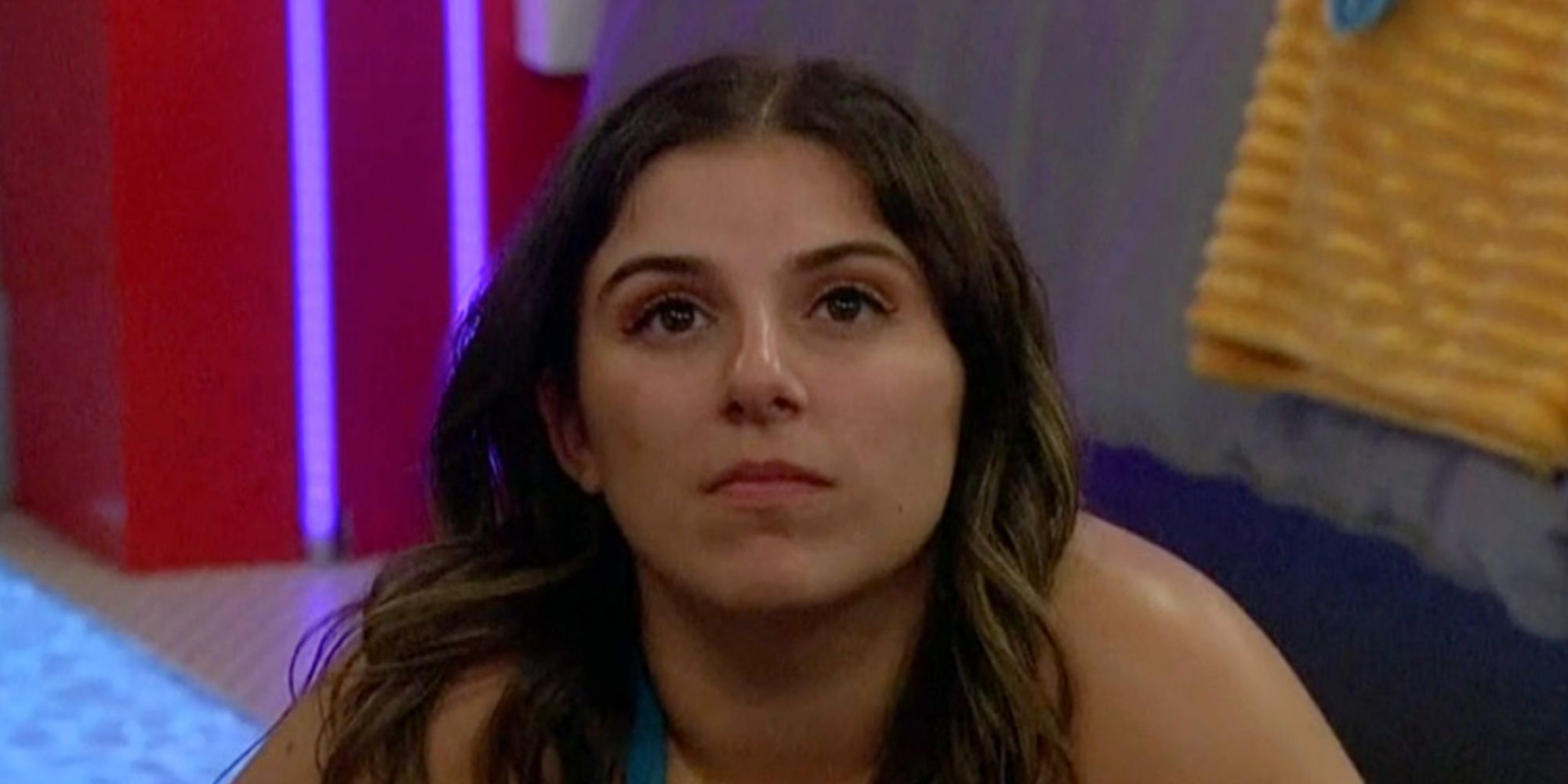 Britini glares into the middle distance on Big Brother.