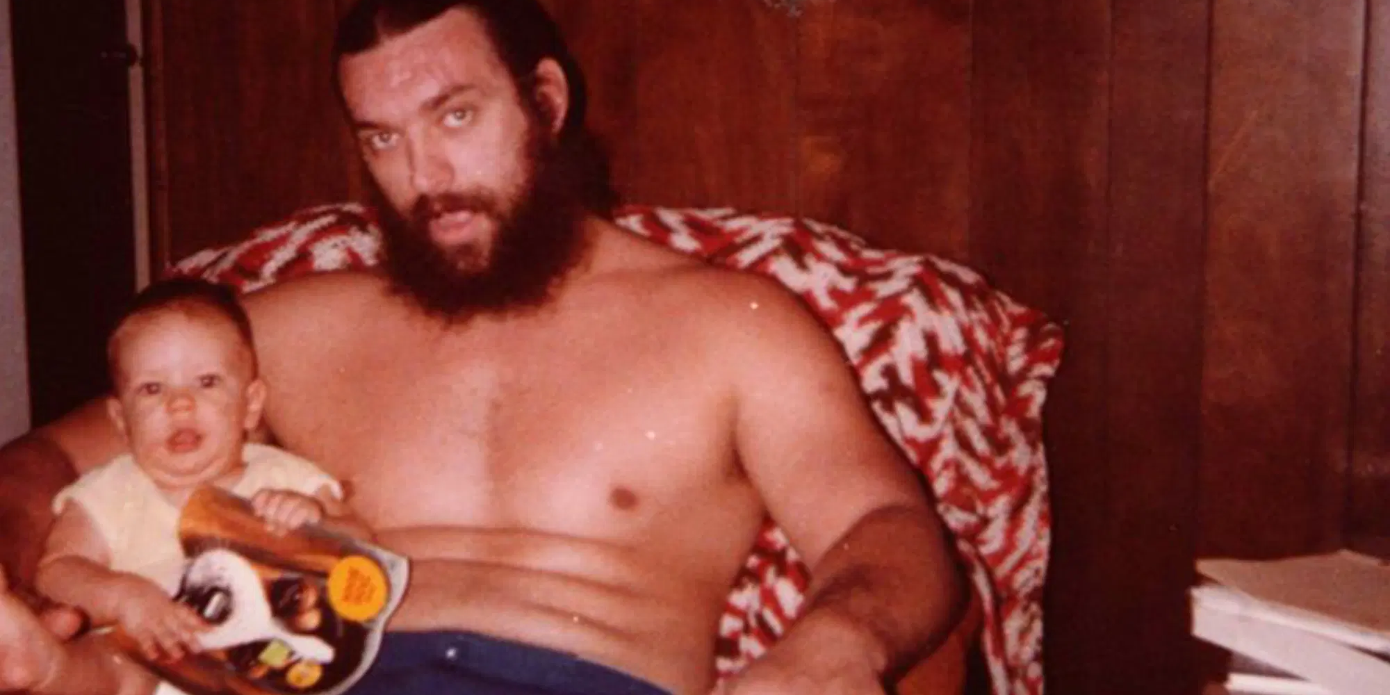 Bruiser Brody with a baby on his lap