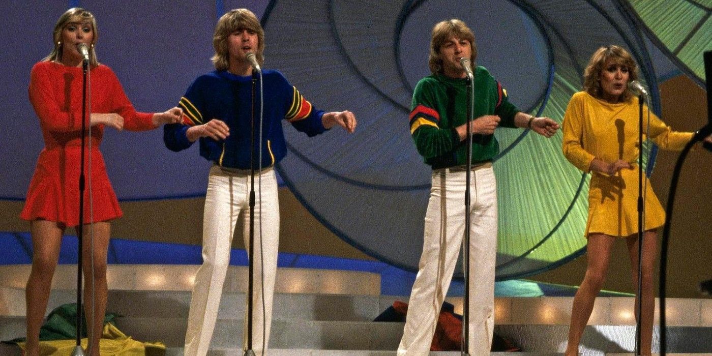 The colorufl Bucks Fizz singing and dancing on stage at Eurovision