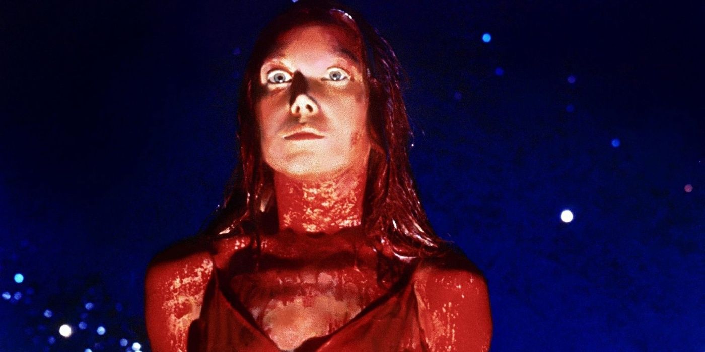 Carrie, covered in blood, looks alarmingly at the prom night crowd in the film Carrie.