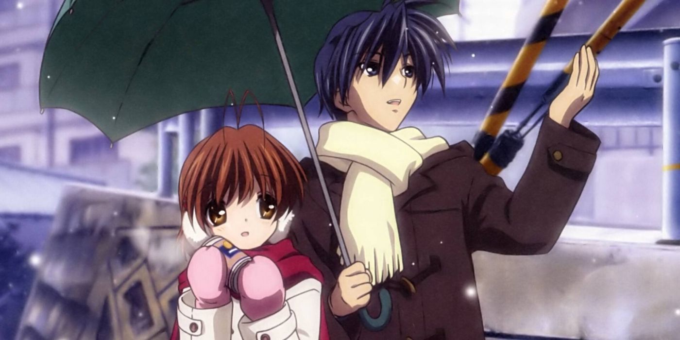 Two characters in the Clannad anime under the snow with an umbrella.