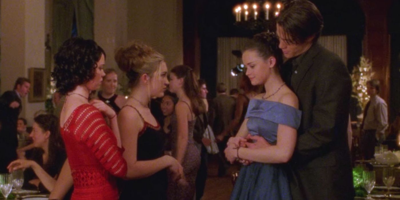 Dean hugs Rory at the school dance on Gilmore Girls