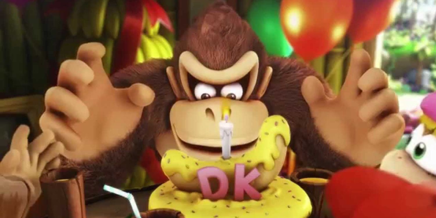 Donkey Kong olhando para um bolo com uma banana em cima.
