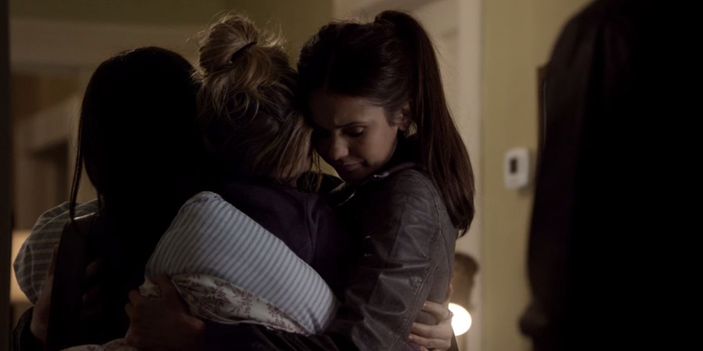 Elena and Bonnie Hugging Caroline