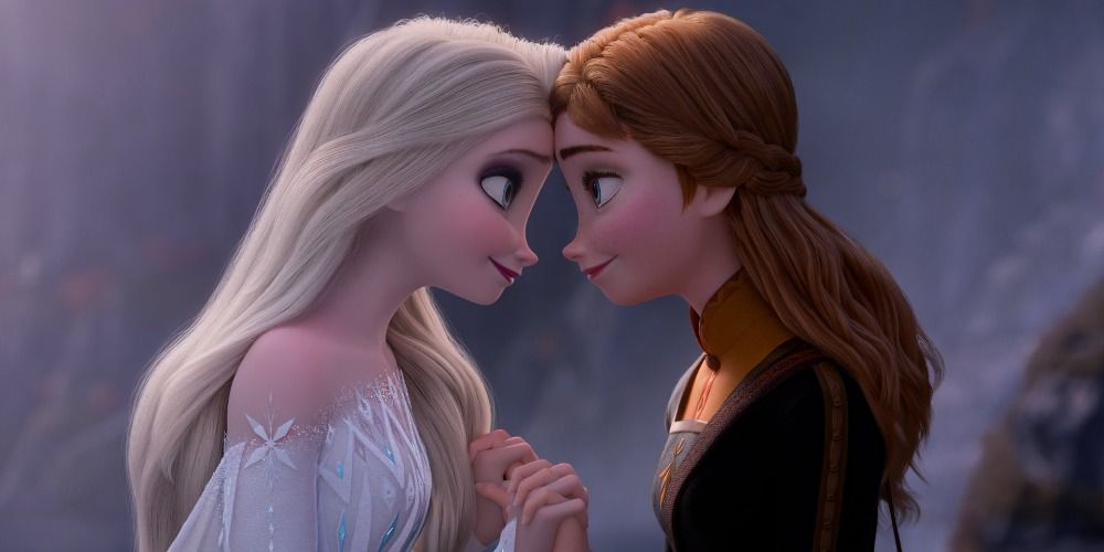 Elsa and Anna from Frozen 2 holding hands and touching foreheads
