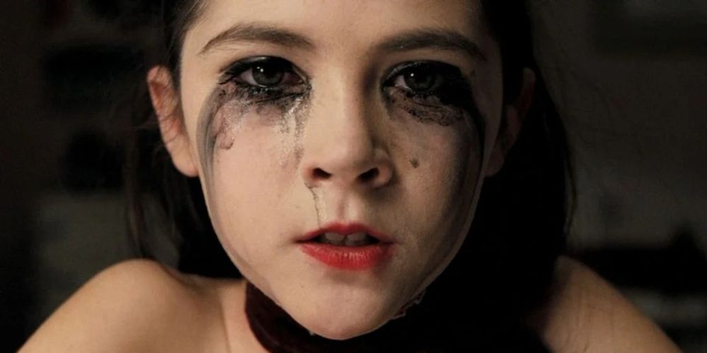 Esther with smeared makeup in Orphan