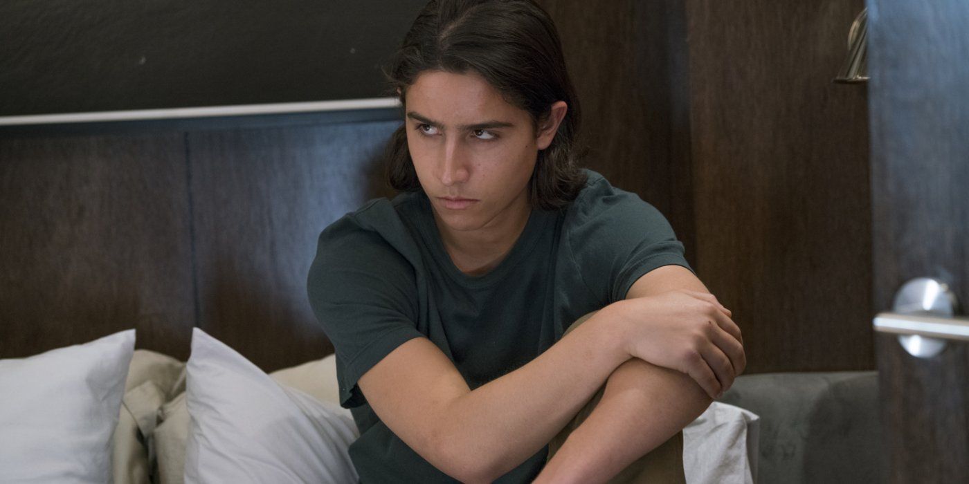 Chris sits on a bed in Fear the Walking Dead