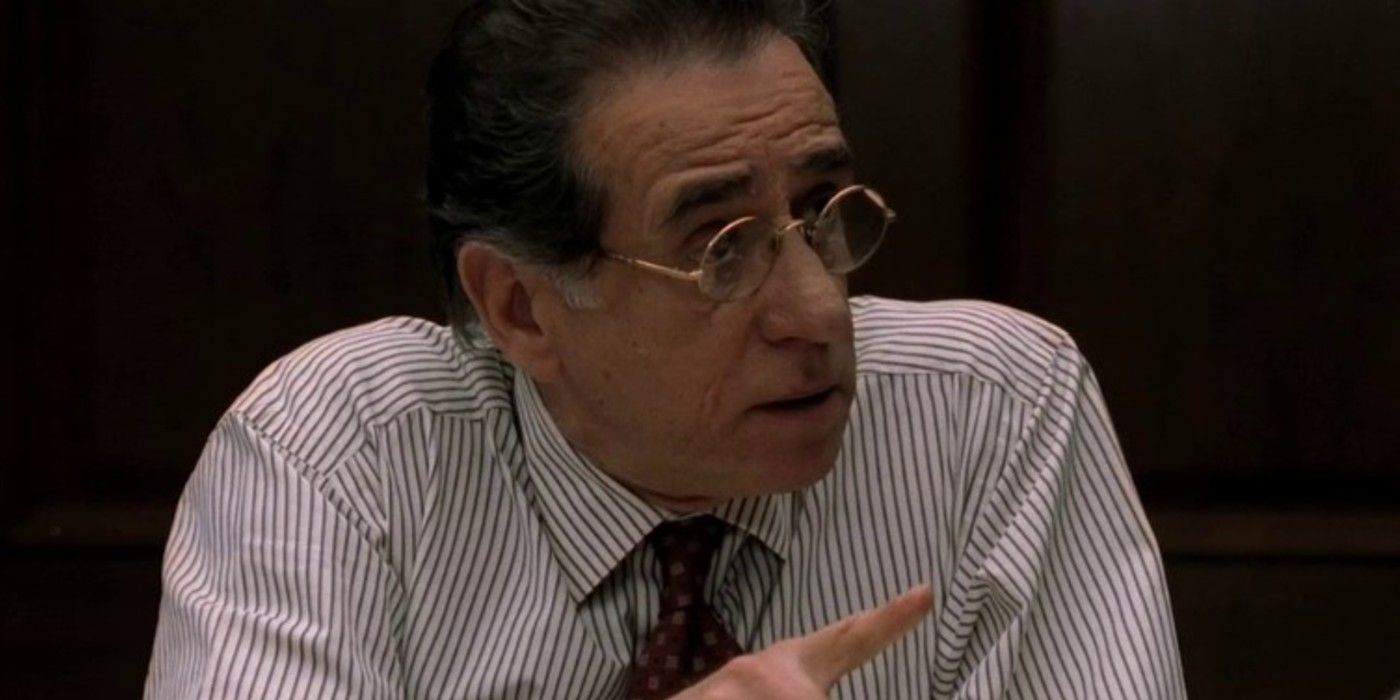 Frank Cubitoso sitting at a desk in The Sopranos