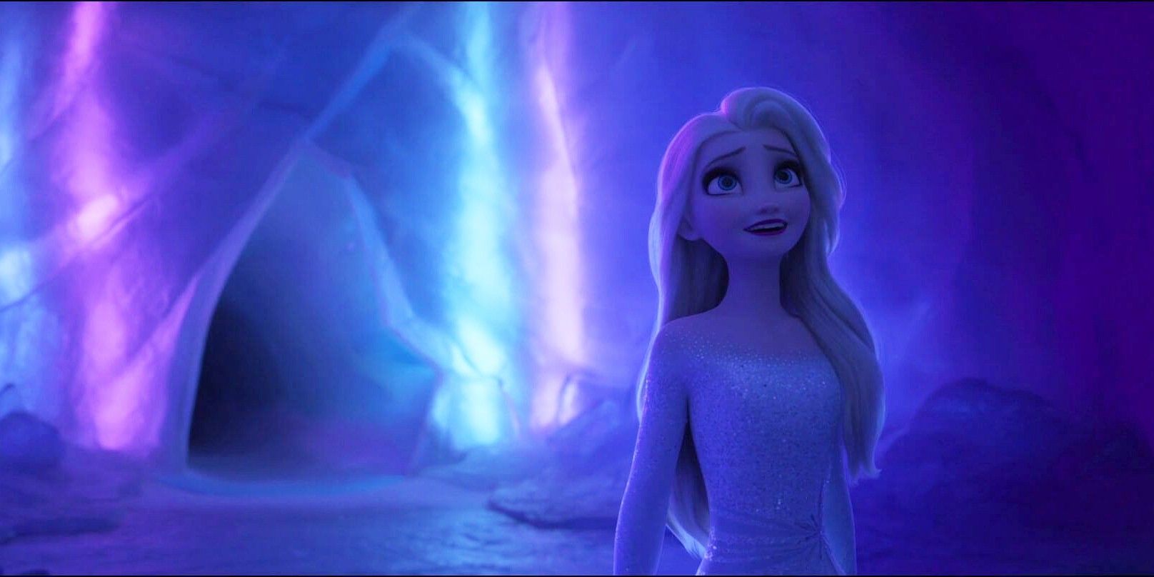 Elsa stands in the cave, discovering she's the fifth spirit in Frozen 2
