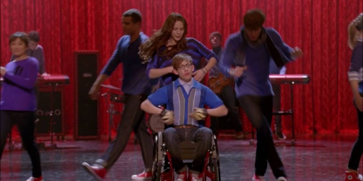 New Directions performing Anything Could Happen in the auditorium