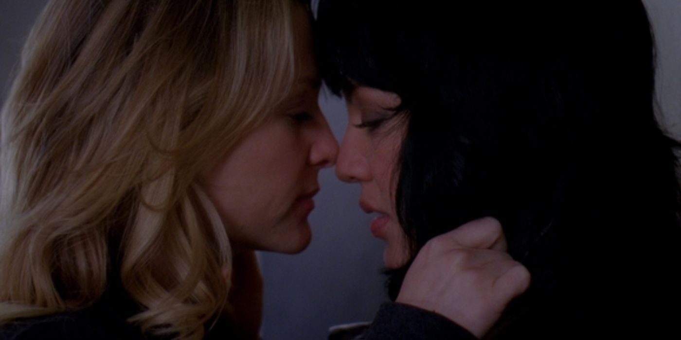 Arizona and Callie about to kiss in an elevator on Grey's Anatomy